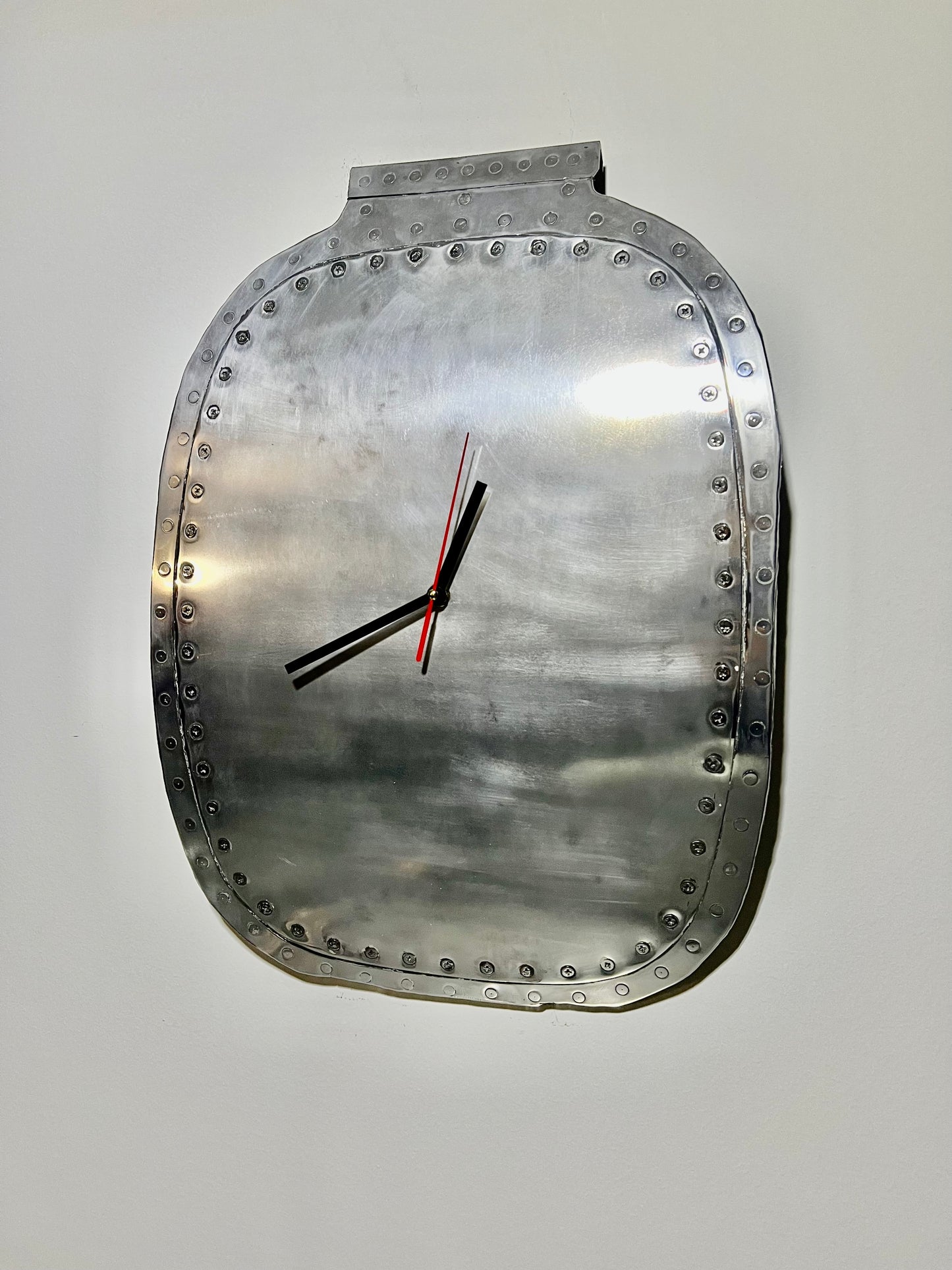 Metroliner window plug wall clock