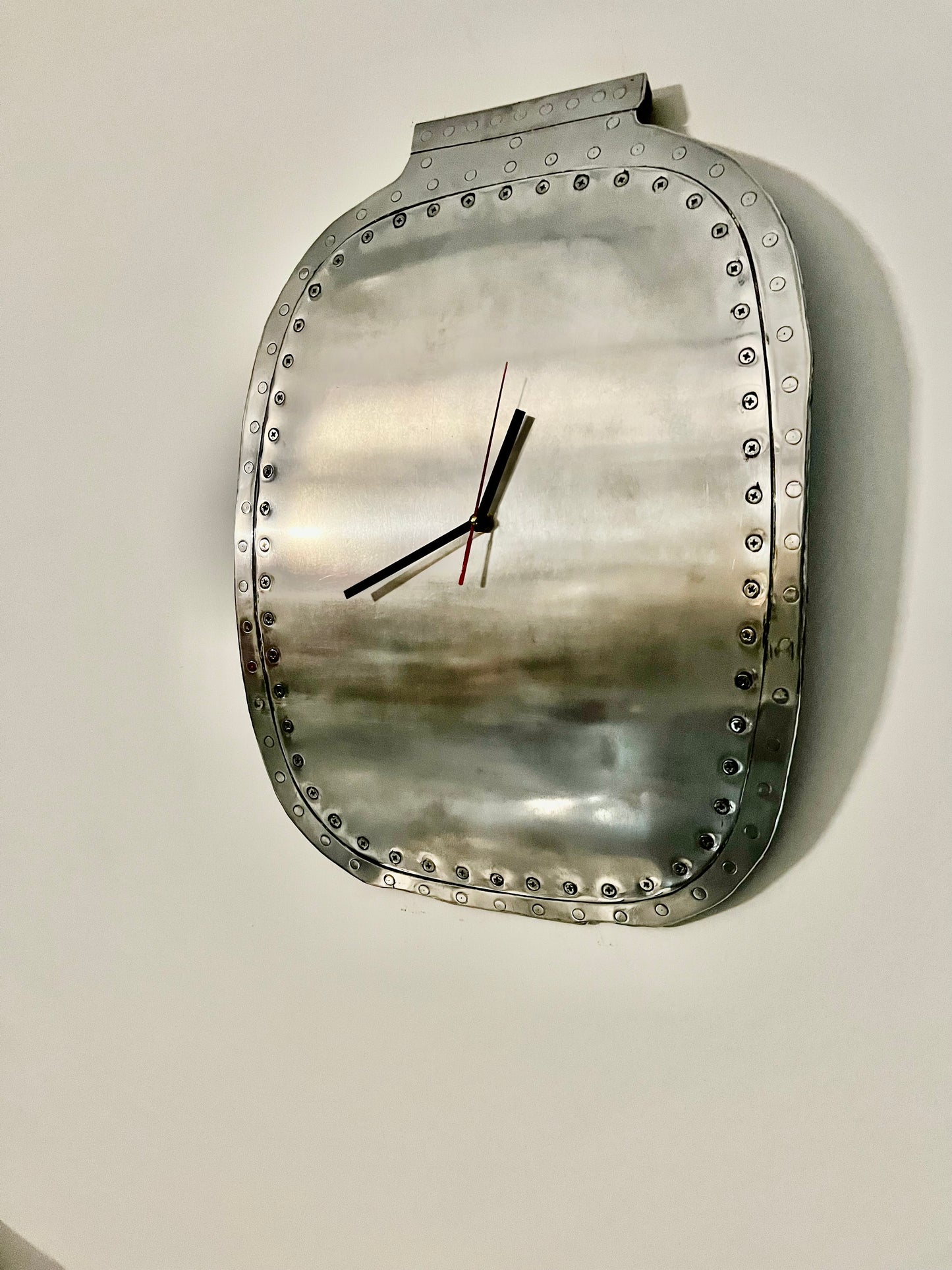 Metroliner window plug wall clock